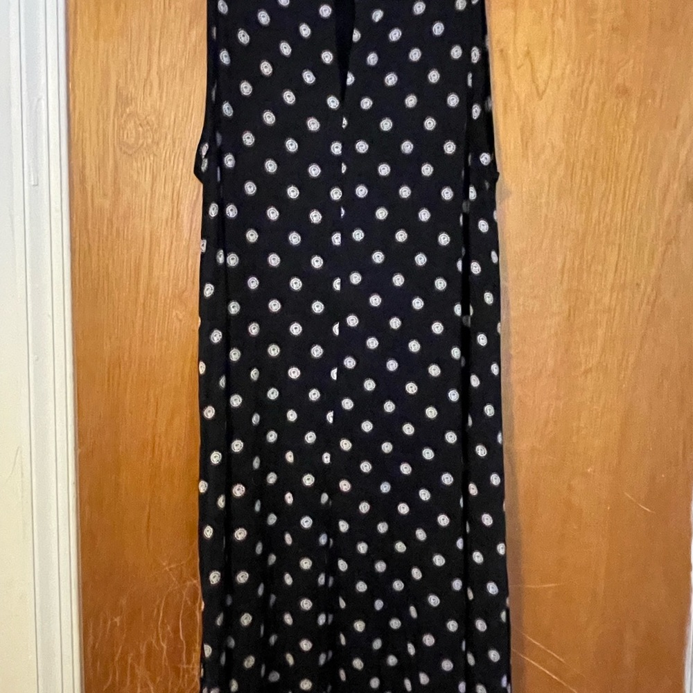 Sleeveless black cotton a-line dress with pink circle design